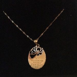 18k yellow gold over SS guardian angel necklace.